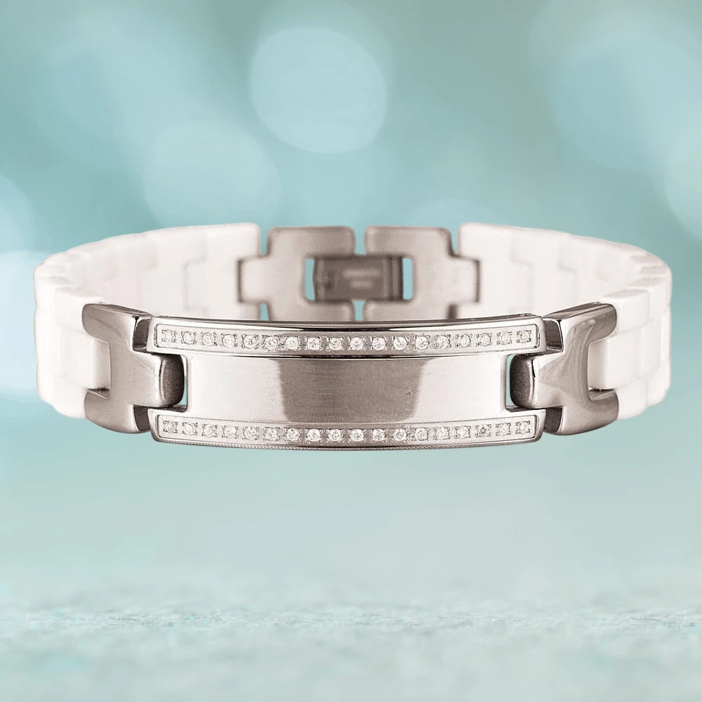 Ceramic Perfection Bracelet for women featuring white ceramic links and rhodium-plated accents with a row of sparkling stones on a sleek rectangular centerpiece.