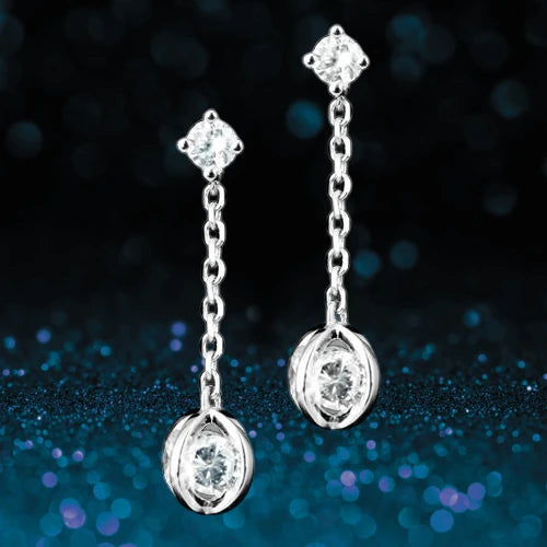 Galaxy Earrings featuring sterling silver chains with sparkling clear stones in a delicate drop design, perfect elegant jewelry for women.