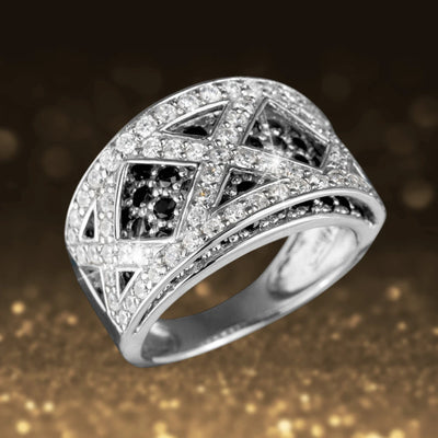 Crisscross Ring featuring an intricate lattice design adorned with sparkling clear and black stones, crafted for a refined and elegant feminine jewelry statement.