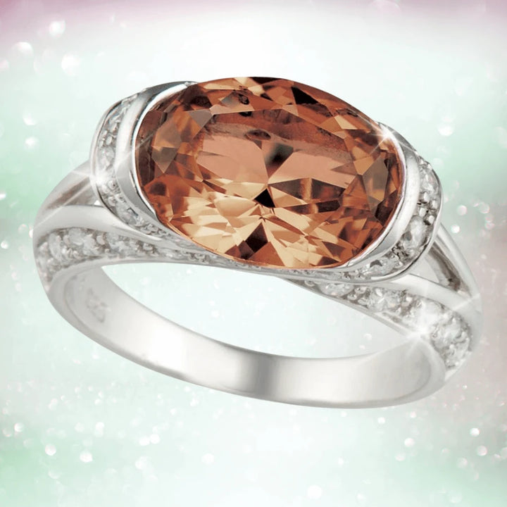 Embrace Ring Brown featuring a large brown gemstone set in sterling silver with rhodium plating, designed elegantly for women as a fine jewelry ring.