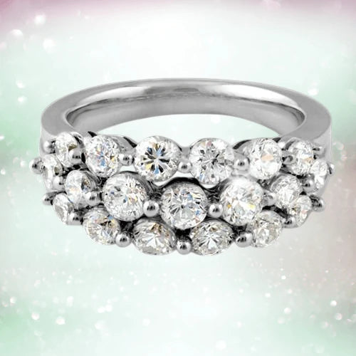 Sterling silver Millionaire Ring for female featuring multiple sparkling round-cut stones in a triple row design, elegant and luxurious fine jewelry piece.