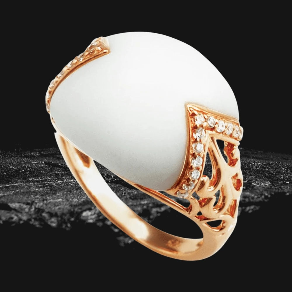 Vienna Ceramic Ring featuring a smooth white ceramic centerpiece set in a sterling silver band plated in rose gold with delicate diamond accents, designed for women’s jewelry.