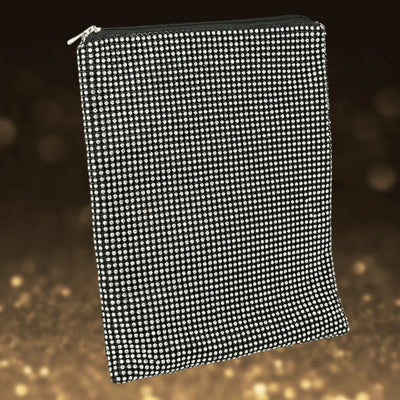 Crystal iPad Cover designed for female users, featuring a sleek black surface adorned with sparkling crystal embellishments and a secure zipper closure.