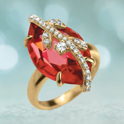 Fire Vine Ring featuring a large red gemstone set in sterling silver with gold plating, accented by sparkling clear crystals in an elegant vine design for women’s jewelry.