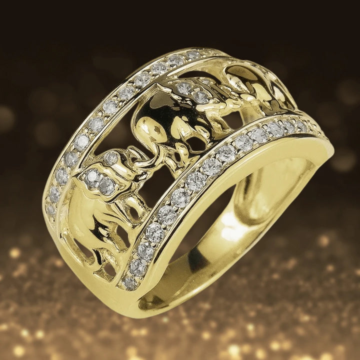 Elephant Parade Ring in sterling silver with gold plating, featuring intricate elephant designs and sparkling stones, elegant jewelry for women.