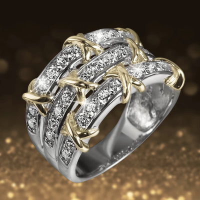 Elegant Sorrento Ring for female, crafted in sterling silver with two-tone plating, featuring a sparkling design of intertwined bands adorned with clear stones.