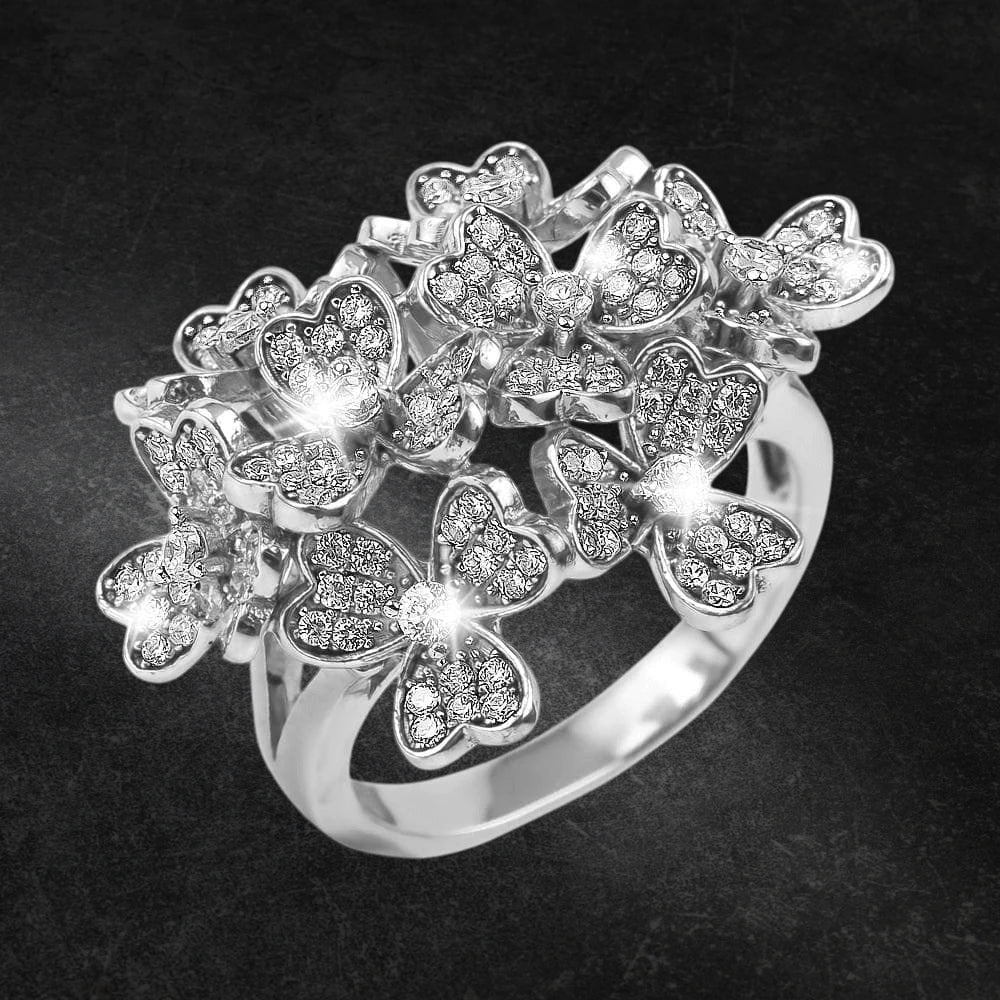 Bouquet Rhodium Ring in sterling silver featuring multiple butterfly motifs encrusted with sparkling stones, designed for women seeking elegant and intricate jewelry.