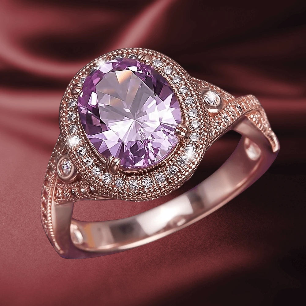Roseanna Ring featuring a large oval purple gemstone set in sterling silver with rose gold plating, accented by small clear stones, designed for women’s jewelry collection.