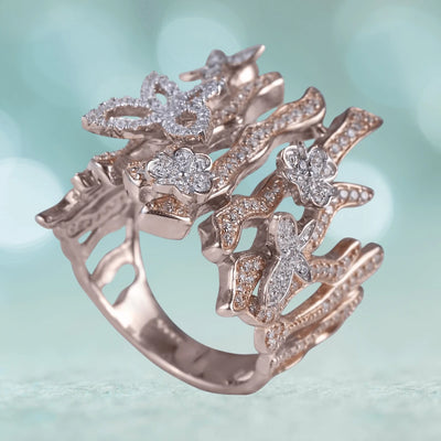 Woodland Butterfly Ring crafted in sterling silver with rose gold plating, featuring intricate butterfly and floral designs adorned with sparkling accents for women’s jewelry.