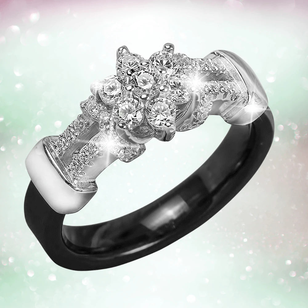 Daisy Ceramic Ring featuring a sterling silver band with rhodium plating, showcasing a floral cluster of sparkling stones designed for women’s jewelry.