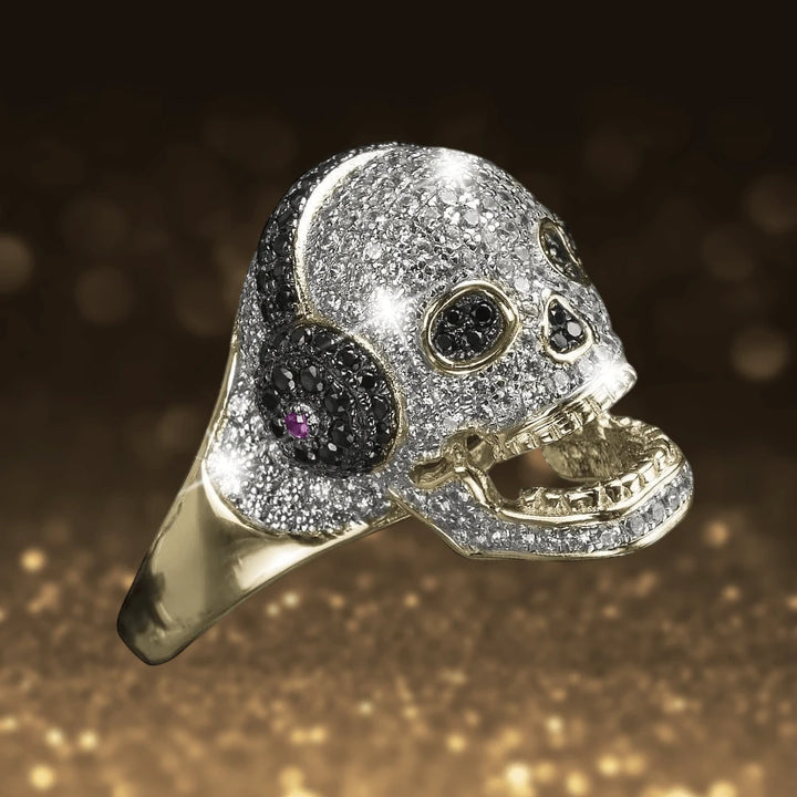 DJ Skull Gold Ring featuring a sterling silver skull encrusted with sparkling stones, gold plating, and intricate black and purple detailing, designed for women’s jewelry.