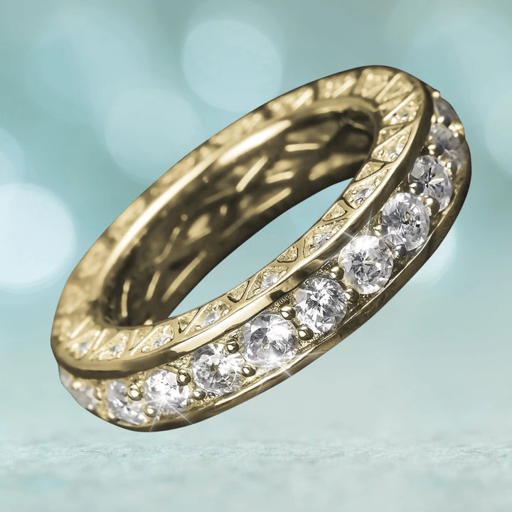 Portofino Yellow Gold Ring crafted from sterling silver with gold plating, featuring a row of sparkling clear stones, designed for women’s elegant jewelry collection.