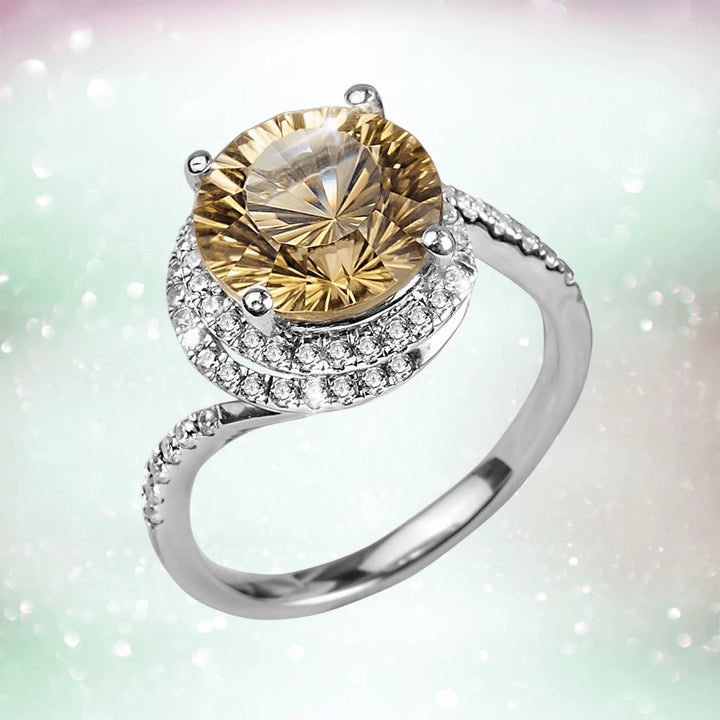 Citrine Firecracker Ring featuring a large golden citrine gemstone set in sterling silver with rhodium plating, accented by sparkling clear stones in an elegant design for women’s jewelry.