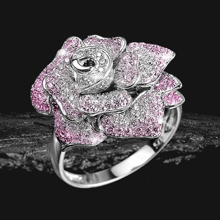 Regal Rose Rhodium Ring featuring sterling silver with rhodium plating, designed as a detailed rose with sparkling pink and clear stones for elegant female jewelry.
