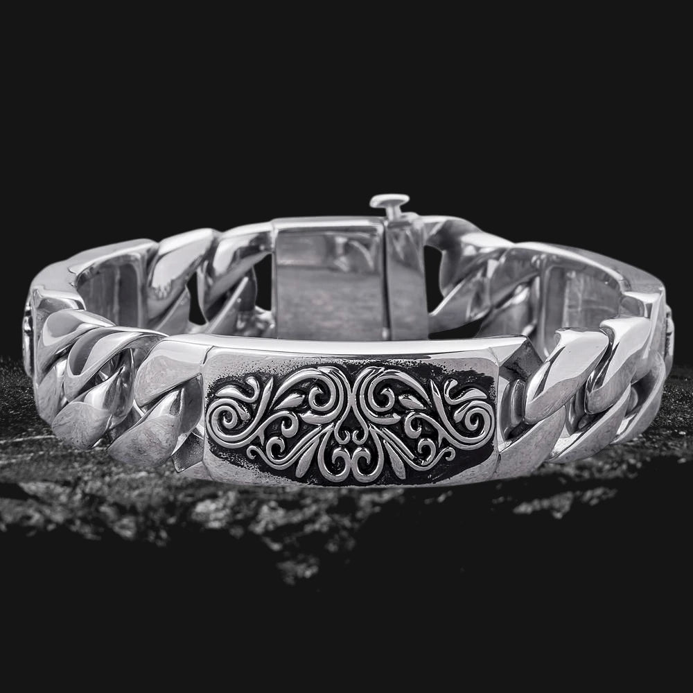 Montana Scroll Bracelet Steel made of stainless steel for men, featuring a bold, polished chain design with an intricate scroll pattern centerpiece.