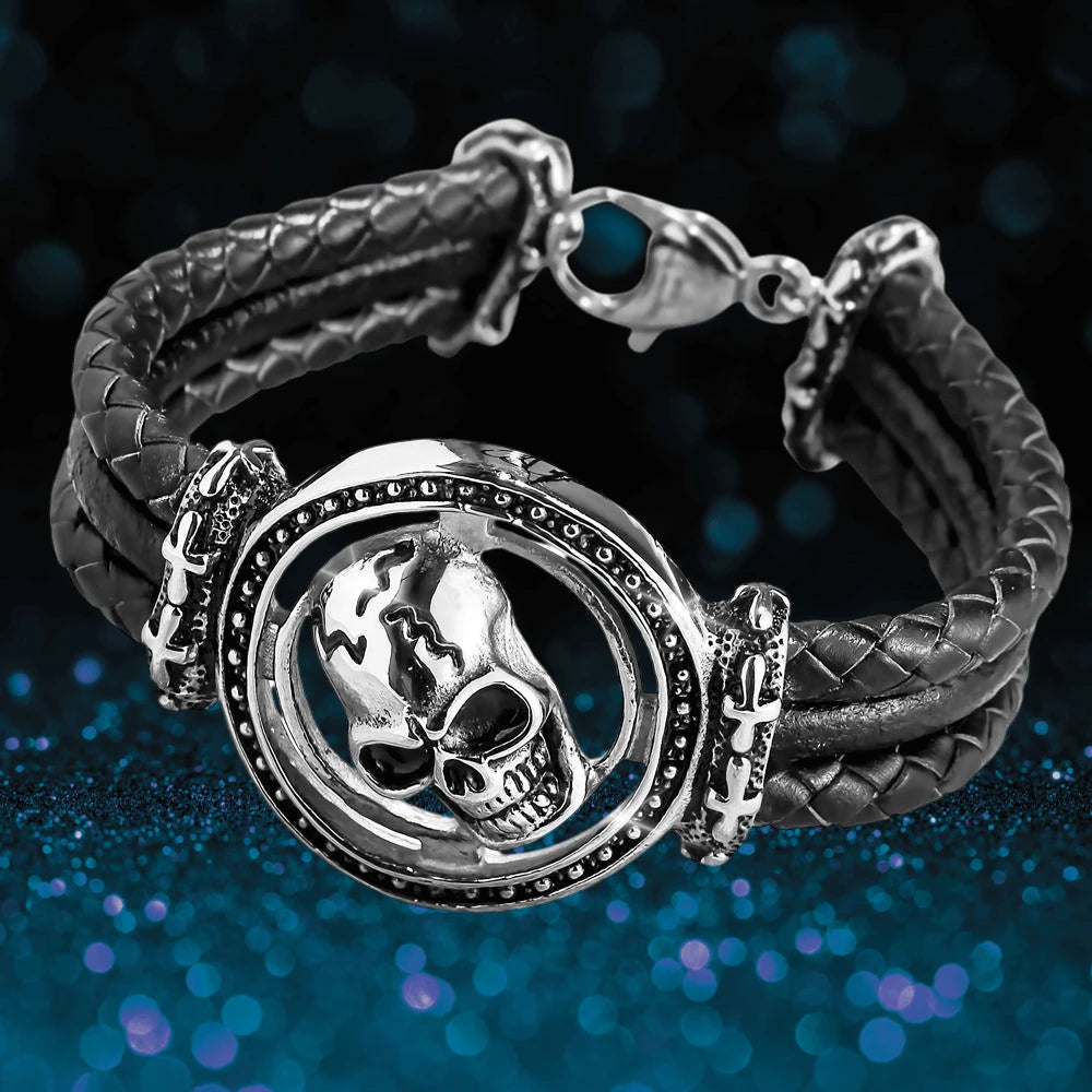 Skull Arena Steel Bracelet featuring a stainless steel skull centerpiece on a braided black band designed for male jewelry collectors and enthusiasts.