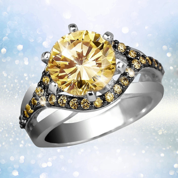 Cafe Mocha Ring featuring a two-tone sterling silver band adorned with yellow gemstones, designed for women, showcasing a large round yellow center stone with smaller matching stones along the band.