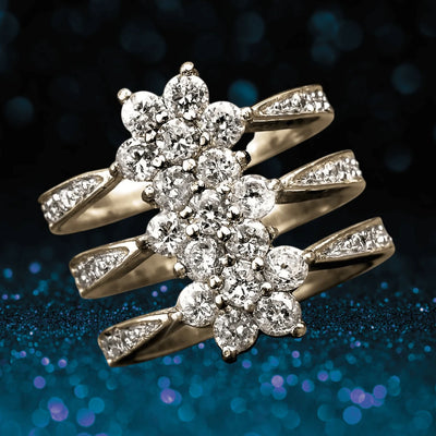 Close-up of a Sterling Silver Flower Journey Yellow Gold Ring for female with gold plating, showcasing a floral cluster design adorned with sparkling clear stones on a glittering dark blue background.