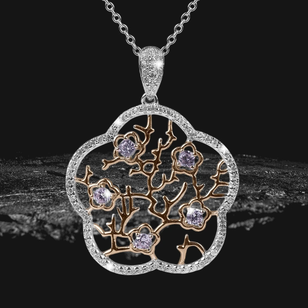 Imperial Cherry Blossom Pendant featuring two-tone sterling silver with delicate branches and sparkling gemstones, designed for a captivating feminine jewelry statement.