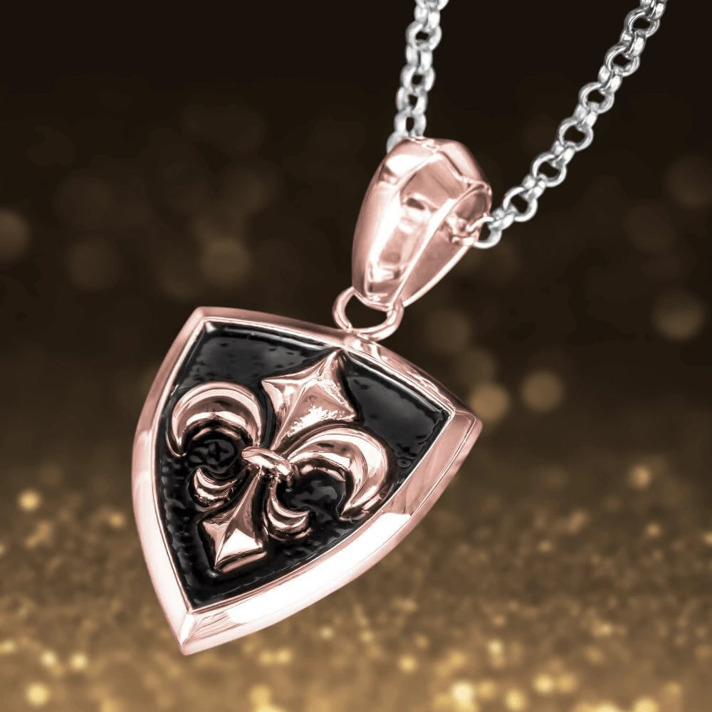 Grand Canyon Rose Gold Pendant featuring a rose gold-plated stainless steel shield design with a fleur-de-lis emblem, suspended from a silver chain, men’s jewelry necklace.