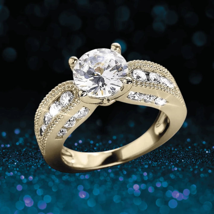 Serena Gold Ring featuring a large round crystal centerpiece set in sterling silver with gold plating, accented by smaller sparkling crystals along the split shank band.