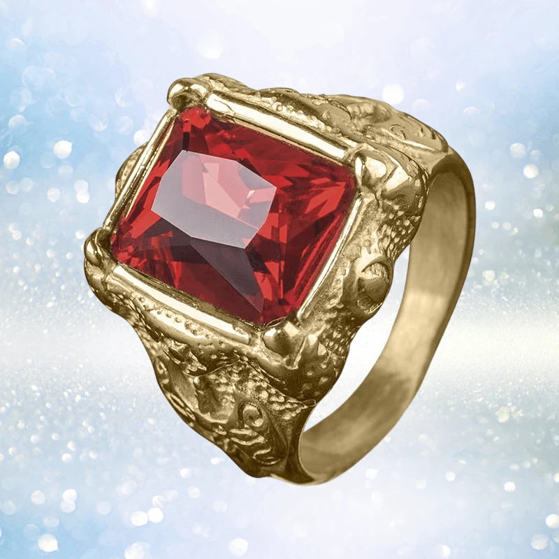 Red Rock Ring featuring a bold red gemstone set in a gold-plated stainless steel band designed for men with an intricate textured finish.