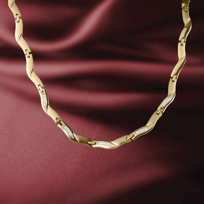 Vicenza Ladies' Necklace featuring a gold-plated stainless steel design with elegant curved links and embedded sparkling accents, perfect for sophisticated jewelry collections.