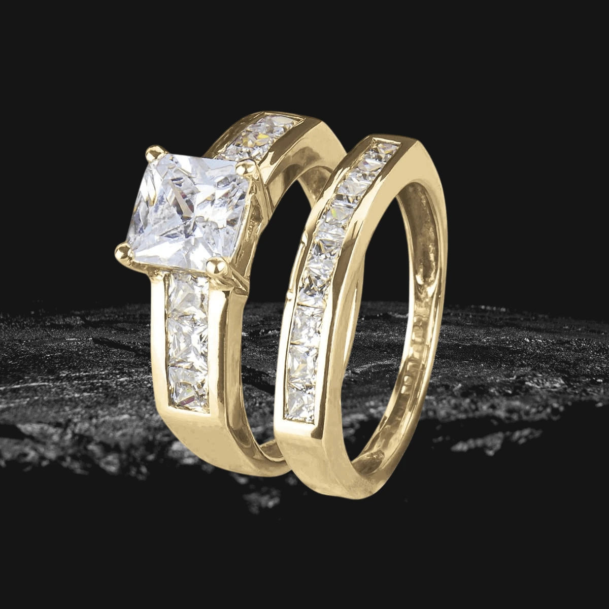 Lanai Duo Bridal Ring featuring sterling silver with gold plating, designed for women, showcasing a square-cut centerpiece and channel-set clear stones along the bands.