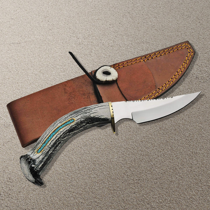 Veteran's Legacy Knife with a stainless steel blade and curved antler handle, displayed with a brown leather sheath, Up To 75% Off Retail.