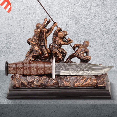 Iwo Jima Valor Dagger displayed on a detailed resin and stainless steel base featuring soldiers raising a flag, a unisex collectible with Up To 75% Off Retail.