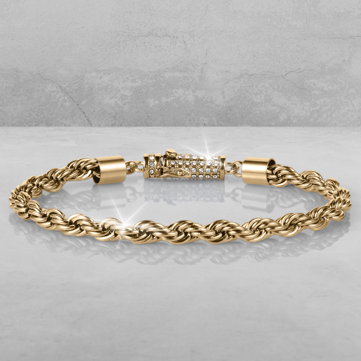 Viper Twist Rope Collection gold tone twisted rope bracelet with sparkling crystal clasp and elegant jewelry detail up to 75 percent off retail