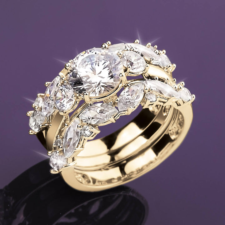 Savoy Bridal Ring featuring a sterling silver base with gold plating, adorned with sparkling clear gemstones, designed for women’s elegant jewelry collections.
