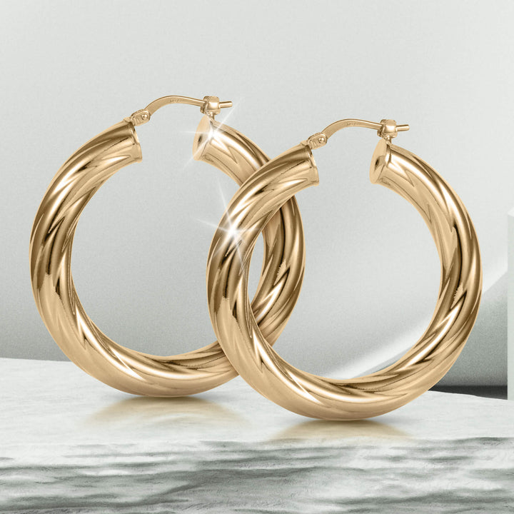 Roma Luxe Twisted Earrings in gold-plated bronze for female, featuring a sleek, twisted hoop design with a polished finish, Up To 75% Off Retail.