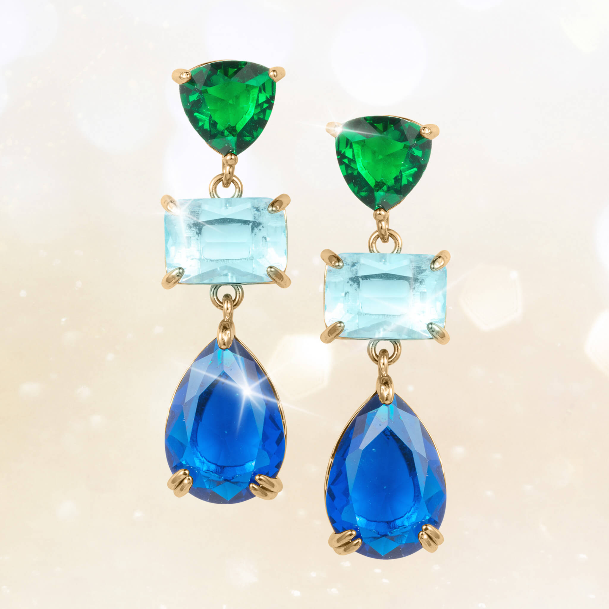 Midnight Riviera Earrings featuring gold plating with vibrant green, light blue, and deep blue gemstones, designed for women seeking elegant jewelry, Up To 75% Off Retail.