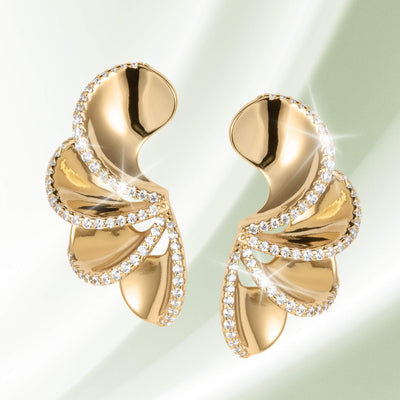 Elegant gold-tone earrings from the Arianna Collection, featuring a sculpted design accented with sparkling crystals, available Up To 75% Off Retail.