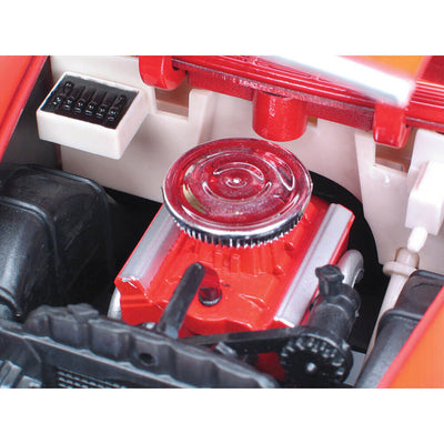 Close-up of the detailed die cast engine of the 1955 Chevrolet Bel Air Convertible - Red model, showcasing precision craftsmanship and vibrant red finish, Up To 75% Off Retail.
