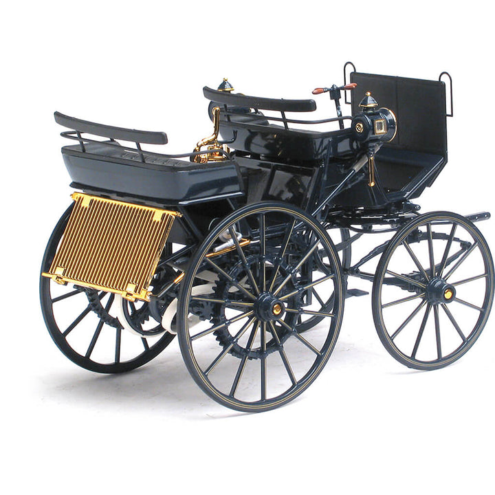 1886 Daimler Motorkutsche die cast model car in black with gold accents, showcasing vintage automotive design, offered Up To 75% Off Retail.