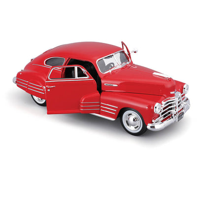 Red die cast 1948 Chevrolet Fleetline Aerosedan model with open doors showcasing detailed interior, offered Up To 75% Off Retail.