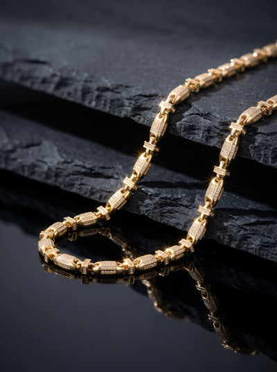 Barbed Necklace gold chain necklace with textured barbed links displayed on layered black slate with a dramatic reflective finish Up To 75% Off Retail
