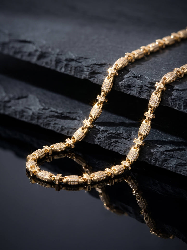 Barbed Necklace gold chain necklace with textured barbed links displayed on layered black slate with a dramatic reflective finish Up To 75% Off Retail