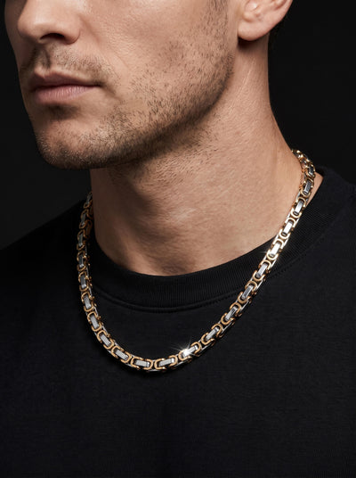 Maximilian Byzantine Necklace worn by a man over a black shirt with a polished gold and silver Byzantine link design Up To 75% Off Retail