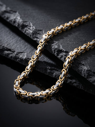 Maximilian Byzantine Necklace featuring gold and silver tone interlocking links on textured black slate with a polished reflective finish Up To 75% Off Retail