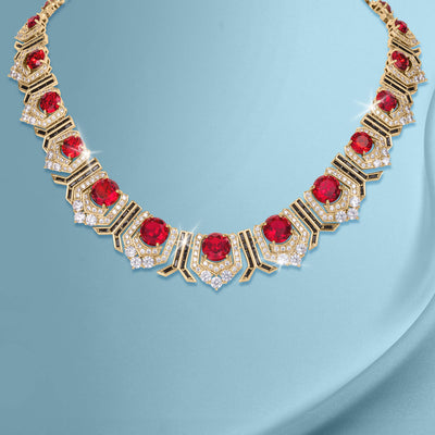 Elegant gold necklace from the Scarlet Heirloom Collection featuring vibrant red gemstones and sparkling crystals, available Up To 75% Off Retail.