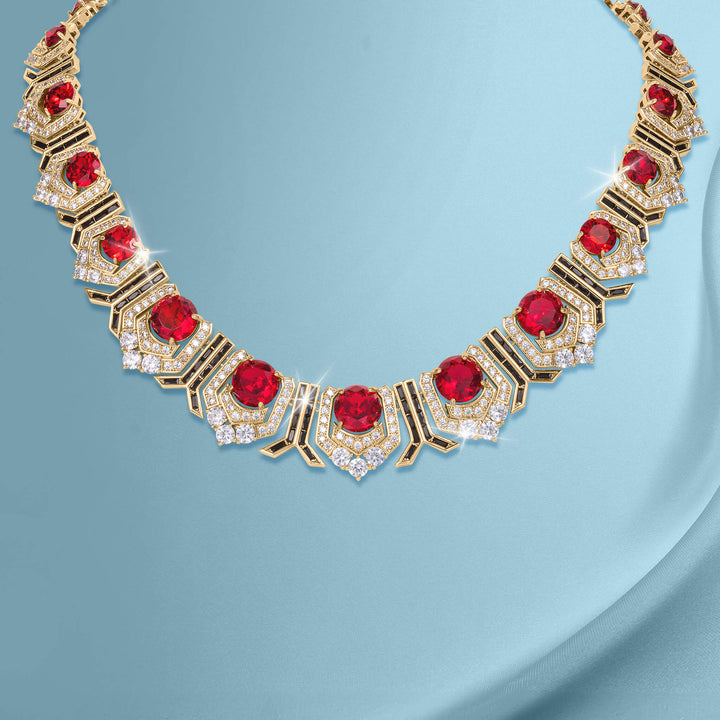 Scarlet Heirloom Necklace featuring bold red gemstones set in an intricate gold design accented with sparkling clear crystals, offering timeless elegance Up To 75% Off Retail.