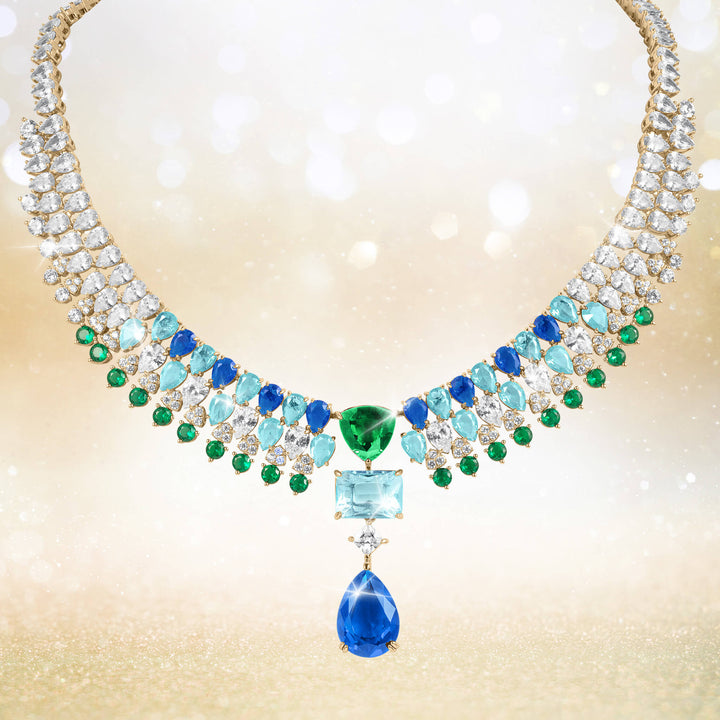 Midnight Riviera Necklace featuring gold plating with vibrant blue, green, and clear gemstones set in an elegant design for a female audience, available Up To 75% Off Retail.