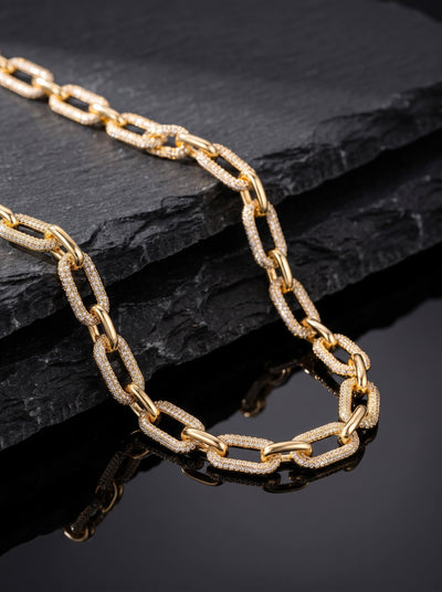 Signature Paperclip Necklace in gold tone link jewelry displayed on textured black slate with a reflective finish Up To 75% Off Retail