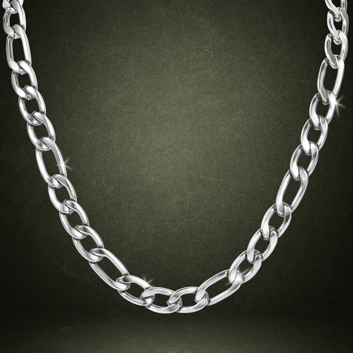 Silver chain necklace with interlocking links displayed against a dark textured background, featuring the Valor Figaro Necklace with Up To 75% Off Retail.
