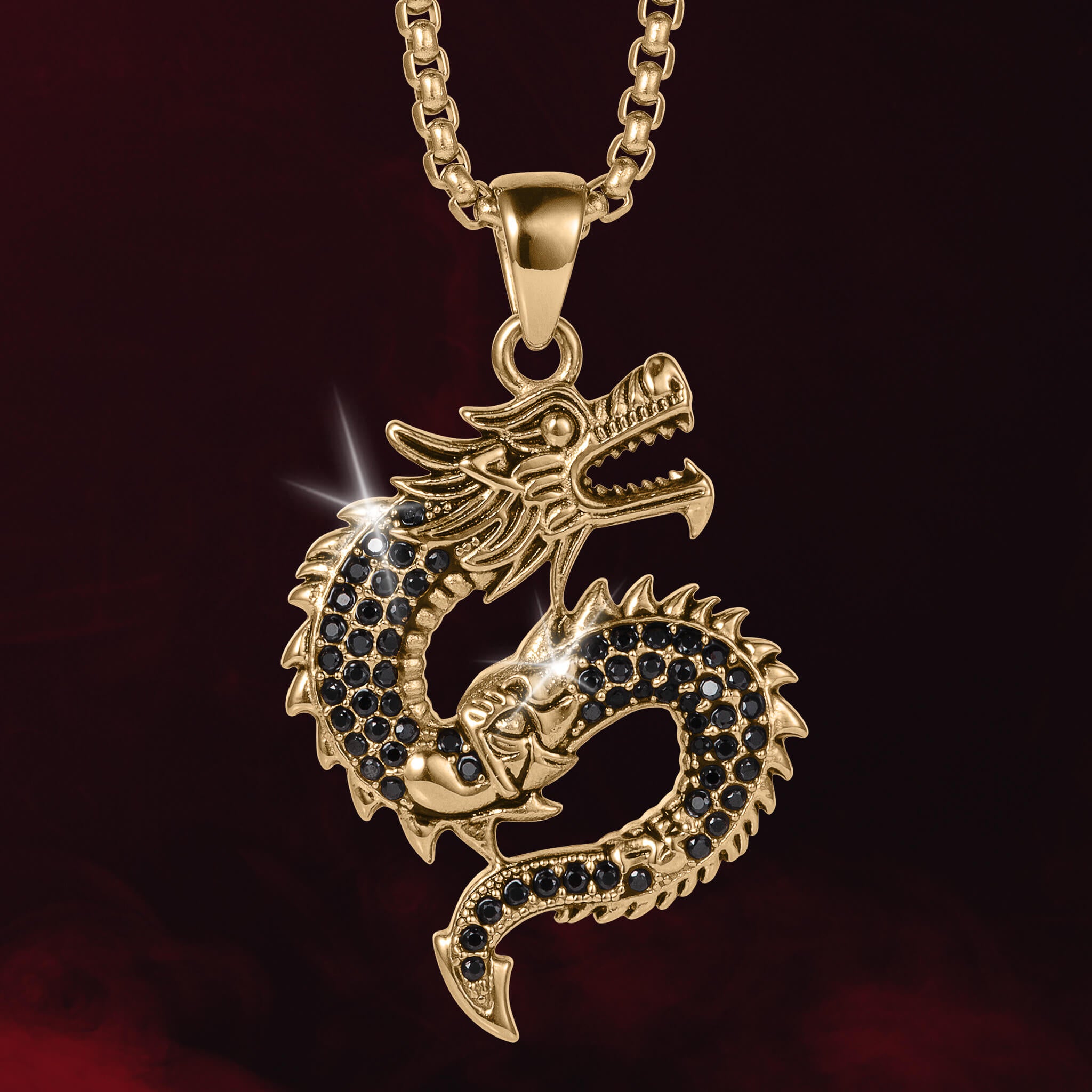 Dragonforge Pendant featuring a gold dragon design with black stone accents on a matching gold chain, offering a bold statement necklace Up To 75% Off Retail.