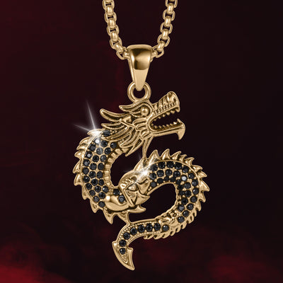 Dragonforge Pendant featuring a gold dragon design with black stone accents on a matching gold chain, offering a bold statement necklace Up To 75% Off Retail.