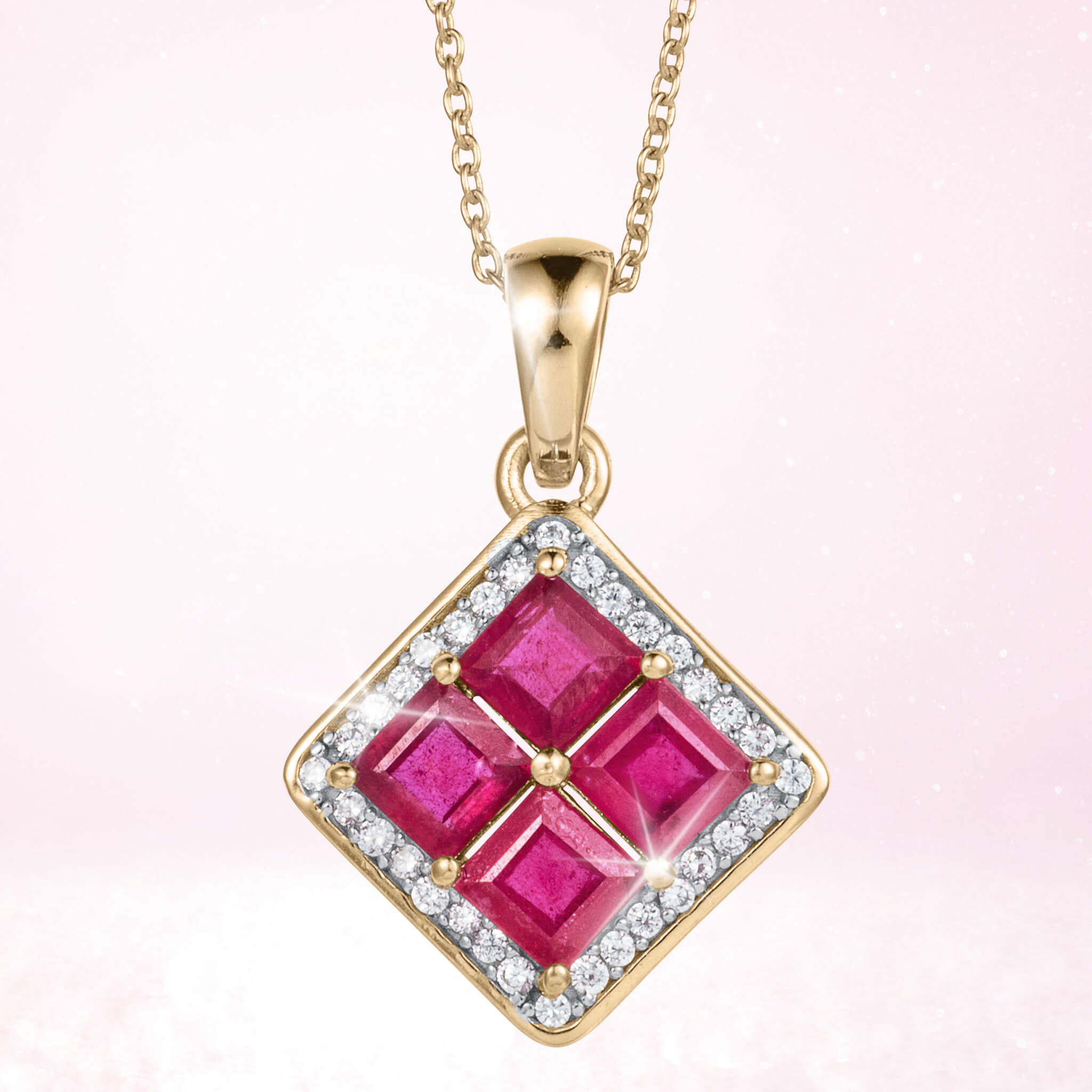 Elegant Rouge Lumiere Ruby Collection pendant featuring gold-plated sterling silver with four vibrant red stones surrounded by sparkling accents, designed for female jewelry lovers Up To 75% Off Retail